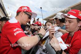 Kimi Raikkonen (FIN) Ferrari signs autographs for the fans. 12.05.2016. Formula 1 World Championship, Rd 5, Spanish Grand Prix, Barcelona, Spain, Preparation Day.