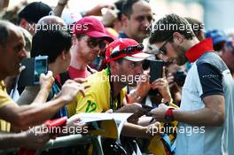 Romain Grosjean (FRA) Haas F1 Team signs autographs for the fans. 12.05.2016. Formula 1 World Championship, Rd 5, Spanish Grand Prix, Barcelona, Spain, Preparation Day.