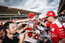 Kimi Raikkonen (FIN) Ferrari with fans. 12.05.2016. Formula 1 World Championship, Rd 5, Spanish Grand Prix, Barcelona, Spain, Preparation Day.