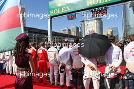 The grid observes the national anthem. 19.06.2016. Formula 1 World Championship, Rd 8, European Grand Prix, Baku Street Circuit, Azerbaijan, Race Day.