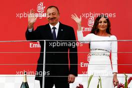 (L to R): Ilham Aliyev (AZE) Azerbaijan President with his wife Mehriban Aliyeva (AZE) on the podium. 19.06.2016. Formula 1 World Championship, Rd 8, European Grand Prix, Baku Street Circuit, Azerbaijan, Race Day.