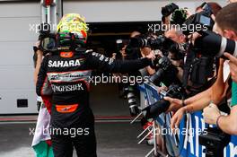 Sergio Perez (MEX) Sahara Force India F1 celebrates his third position in parc ferme. 19.06.2016. Formula 1 World Championship, Rd 8, European Grand Prix, Baku Street Circuit, Azerbaijan, Race Day.