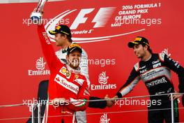 Sebastian Vettel (GER) Ferrari celebrates his second position on the podium. 19.06.2016. Formula 1 World Championship, Rd 8, European Grand Prix, Baku Street Circuit, Azerbaijan, Race Day.