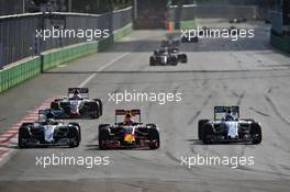 (L to R): Lewis Hamilton (GBR) Mercedes AMG F1 W07 Hybrid, Max Verstappen (NLD) Red Bull Racing RB12, and Valtteri Bottas (FIN) Williams FW38 battle for position. 19.06.2016. Formula 1 World Championship, Rd 8, European Grand Prix, Baku Street Circuit, Azerbaijan, Race Day.