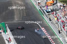 Daniil Kvyat (RUS) Scuderia Toro Rosso STR11 locks up under braking. 19.06.2016. Formula 1 World Championship, Rd 8, European Grand Prix, Baku Street Circuit, Azerbaijan, Race Day.