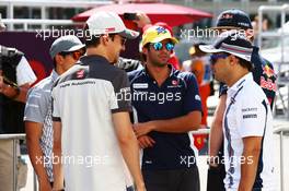 (L to R): Esteban Gutierrez (MEX) Haas F1 Team with Felipe Nasr (BRA) Sauber F1 Team and Felipe Massa (BRA) Williams on the drivers parade. 19.06.2016. Formula 1 World Championship, Rd 8, European Grand Prix, Baku Street Circuit, Azerbaijan, Race Day.