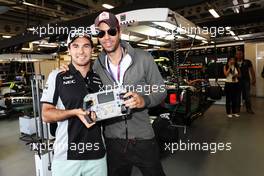 (L to R): Sergio Perez (MEX) Sahara Force India F1 with Enrique Iglesias (ESP) Singer. 19.06.2016. Formula 1 World Championship, Rd 8, European Grand Prix, Baku Street Circuit, Azerbaijan, Race Day.