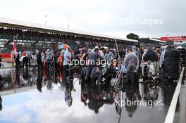A Waterlogged grid. 10.07.2016. Formula 1 World Championship, Rd 10, British Grand Prix, Silverstone, England, Race Day.