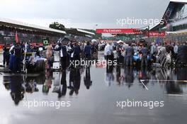 A Water logged grid. 10.07.2016. Formula 1 World Championship, Rd 10, British Grand Prix, Silverstone, England, Race Day.
