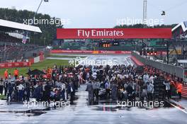 The Grid in the wet. 10.07.2016. Formula 1 World Championship, Rd 10, British Grand Prix, Silverstone, England, Race Day.