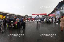 Rain on the grid. 10.07.2016. Formula 1 World Championship, Rd 10, British Grand Prix, Silverstone, England, Race Day.