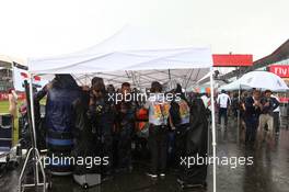 Red Bull racing keeping dry on the grid. 10.07.2016. Formula 1 World Championship, Rd 10, British Grand Prix, Silverstone, England, Race Day.