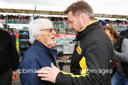 (L to R): Bernie Ecclestone (GBR) with Paul Hembery (GBR) Pirelli Motorsport Director on the grid. 10.07.2016. Formula 1 World Championship, Rd 10, British Grand Prix, Silverstone, England, Race Day.