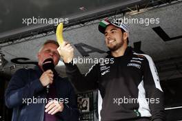 (L to R): Johnny Herbert (GBR) Sky Sports F1 Presenter with Sergio Perez (MEX) Sahara Force India F1 at the Sahara Force India F1 Team Fan Zone at Woodlands Campsite. 09.07.2016. Formula 1 World Championship, Rd 10, British Grand Prix, Silverstone, England, Qualifying Day.