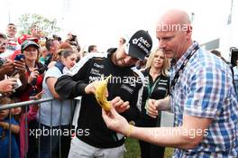 Sergio Perez (MEX) Sahara Force India F1 signs autographs for the fans at the Sahara Force India F1 Team Fan Zone at Woodlands Campsite. 09.07.2016. Formula 1 World Championship, Rd 10, British Grand Prix, Silverstone, England, Qualifying Day.