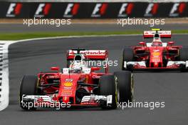 Sebastian Vettel (GER) Ferrari SF16-H leads team mate Kimi Raikkonen (FIN) Ferrari SF16-H. 09.07.2016. Formula 1 World Championship, Rd 10, British Grand Prix, Silverstone, England, Qualifying Day.