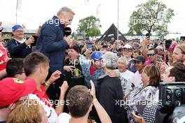 Johnny Herbert (GBR) Sky Sports F1 Presenter and Damon Hill (GBR) Sky Sports Presenter with fans at the Sahara Force India F1 Team Fan Zone at Woodlands Campsite. 09.07.2016. Formula 1 World Championship, Rd 10, British Grand Prix, Silverstone, England, Qualifying Day.