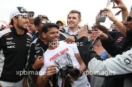 Sergio Perez (MEX) Sahara Force India F1 with fans at the Sahara Force India F1 Team Fan Zone at Woodlands Campsite. 09.07.2016. Formula 1 World Championship, Rd 10, British Grand Prix, Silverstone, England, Qualifying Day.