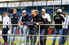 (L to R): Marcus Ericsson (SWE) Sauber F1 Team and Kevin Magnussen (DEN) Renault Sport F1 Team on the drivers parade. 10.07.2016. Formula 1 World Championship, Rd 10, British Grand Prix, Silverstone, England, Race Day.