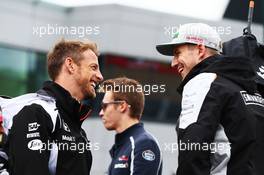 (L to R): Jenson Button (GBR) McLaren with Nico Hulkenberg (GER) Sahara Force India F1 on the drivers parade. 10.07.2016. Formula 1 World Championship, Rd 10, British Grand Prix, Silverstone, England, Race Day.