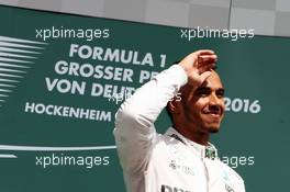 Race winner Lewis Hamilton (GBR) Mercedes AMG F1 celebrates on the podium. 31.07.2016. Formula 1 World Championship, Rd 12, German Grand Prix, Hockenheim, Germany, Race Day.
