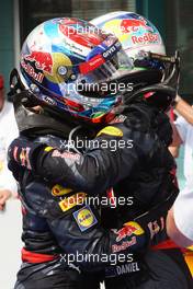 (L to R): Max Verstappen (NLD) Red Bull Racing celebrates his third position with second placed team mate Daniel Ricciardo (AUS) Red Bull Racing in parc ferme. 31.07.2016. Formula 1 World Championship, Rd 12, German Grand Prix, Hockenheim, Germany, Race Day.