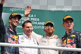 The podium (L to R): Daniel Ricciardo (AUS) Red Bull Racing, second; Matt Deane (GBR) Mercedes AMG F1 Race Engineer; Lewis Hamilton (GBR) Mercedes AMG F1, race winner; Max Verstappen (NLD) Red Bull Racing, third. 31.07.2016. Formula 1 World Championship, Rd 12, German Grand Prix, Hockenheim, Germany, Race Day.