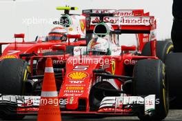 Sebastian Vettel (GER) Ferrari SF16-H and team mate Kimi Raikkonen (FIN) Ferrari SF16-H in parc ferme. 31.07.2016. Formula 1 World Championship, Rd 12, German Grand Prix, Hockenheim, Germany, Race Day.