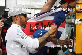 Race winner Lewis Hamilton (GBR) Mercedes AMG F1 celebrates with the fans. 31.07.2016. Formula 1 World Championship, Rd 12, German Grand Prix, Hockenheim, Germany, Race Day.