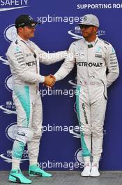 (L to R): Nico Rosberg (GER) Mercedes AMG F1 celebrates his pole position in parc ferme with second placed team mate Lewis Hamilton (GBR) Mercedes AMG F1. 30.07.2016. Formula 1 World Championship, Rd 12, German Grand Prix, Hockenheim, Germany, Qualifying Day.