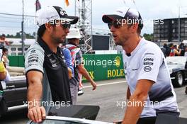 (L to R): Sergio Perez (MEX) Sahara Force India F1 with Jenson Button (GBR) McLaren on the drivers parade. 31.07.2016. Formula 1 World Championship, Rd 12, German Grand Prix, Hockenheim, Germany, Race Day.