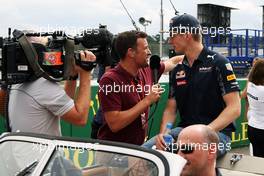 (L to R): Will Buxton (GBR) NBC Sports Network TV Presenter with Max Verstappen (NLD) Red Bull Racing on the drivers parade. 31.07.2016. Formula 1 World Championship, Rd 12, German Grand Prix, Hockenheim, Germany, Race Day.