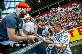 Mika Hakkinen (FIN) signing autographs 27.07.2016. Formula 1 World Championship, Rd 12, German Grand Prix, Mainz, Germany, Football match Champions for charity.