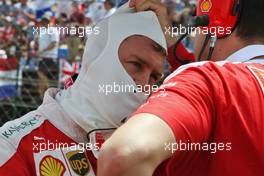 Sebastian Vettel (GER) Ferrari on the grid. 24.07.2016. Formula 1 World Championship, Rd 11, Hungarian Grand Prix, Budapest, Hungary, Race Day.