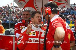 Sebastian Vettel (GER) Ferrari on the grid. 24.07.2016. Formula 1 World Championship, Rd 11, Hungarian Grand Prix, Budapest, Hungary, Race Day.