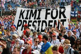 Kimi for President banner with fans at the podium. 24.07.2016. Formula 1 World Championship, Rd 11, Hungarian Grand Prix, Budapest, Hungary, Race Day.
