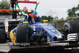 The damaged Sauber C35 of Marcus Ericsson (SWE) Sauber F1 Team is recovered back to the pits on the back of a truck during qualifying. 23.07.2016. Formula 1 World Championship, Rd 11, Hungarian Grand Prix, Budapest, Hungary, Qualifying Day.
