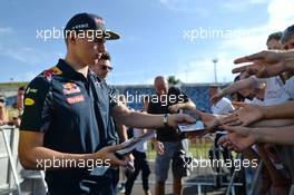 Max Verstappen (NLD) Red Bull Racing signs autographs for the fans. 21.07.2016. Formula 1 World Championship, Rd 11, Hungarian Grand Prix, Budapest, Hungary, Preparation Day.