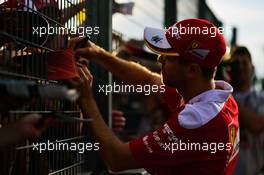 Sebastian Vettel (GER) Ferrari signs autographs for the fans. 21.07.2016. Formula 1 World Championship, Rd 11, Hungarian Grand Prix, Budapest, Hungary, Preparation Day.