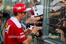 Kimi Raikkonen (FIN) Ferrari signs autographs for the fans. 21.07.2016. Formula 1 World Championship, Rd 11, Hungarian Grand Prix, Budapest, Hungary, Preparation Day.