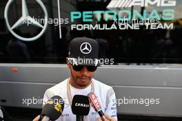 Lewis Hamilton (GBR) Mercedes AMG F1 with the media. 21.07.2016. Formula 1 World Championship, Rd 11, Hungarian Grand Prix, Budapest, Hungary, Preparation Day.