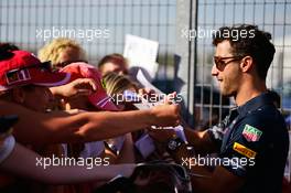 Daniel Ricciardo (AUS) Red Bull Racing signs autographs for the fans. 21.07.2016. Formula 1 World Championship, Rd 11, Hungarian Grand Prix, Budapest, Hungary, Preparation Day.