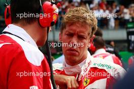 Sebastian Vettel (GER) Ferrari on the grid. 04.09.2016. Formula 1 World Championship, Rd 14, Italian Grand Prix, Monza, Italy, Race Day.