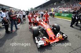 Kimi Raikkonen (FIN) Ferrari SF16-H on the grid. 04.09.2016. Formula 1 World Championship, Rd 14, Italian Grand Prix, Monza, Italy, Race Day.
