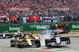 (L to R): Crash involving Jolyon Palmer (GBR) Renault Sport F1 Team RS16 and Felipe Nasr (BRA) Sauber C35. 04.09.2016. Formula 1 World Championship, Rd 14, Italian Grand Prix, Monza, Italy, Race Day.