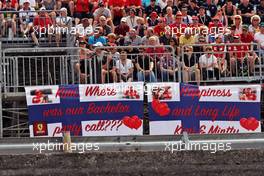 Banners from Kimi Raikkonen (FIN) Ferrari fans.