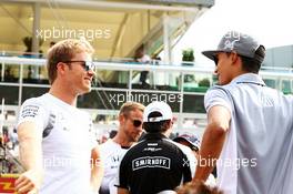 (L to R): Nico Rosberg (GER) Mercedes AMG F1 with Pascal Wehrlein (GER) Manor Racing on the drivers parade. 04.09.2016. Formula 1 World Championship, Rd 14, Italian Grand Prix, Monza, Italy, Race Day.