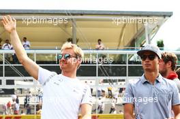 (L to R): Nico Rosberg (GER) Mercedes AMG F1 with Pascal Wehrlein (GER) Manor Racing on the drivers parade. 04.09.2016. Formula 1 World Championship, Rd 14, Italian Grand Prix, Monza, Italy, Race Day.