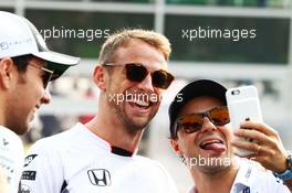 (L to R): Jenson Button (GBR) McLaren with Felipe Massa (BRA) Williams on the drivers parade. 04.09.2016. Formula 1 World Championship, Rd 14, Italian Grand Prix, Monza, Italy, Race Day.