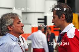 (L to R): Carlos Sainz (ESP) with Massimo Rivola (ITA) Ferrari Driver Academy Director. 04.09.2016. Formula 1 World Championship, Rd 14, Italian Grand Prix, Monza, Italy, Race Day.